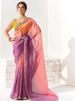 Woman wearing a colorful saree with a white background