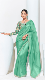 GREEN SILK SAREE WITH FLORAL BLOUSE – A PERFECT BLEND OF GRACE & ELEGANCE - Kimora.in