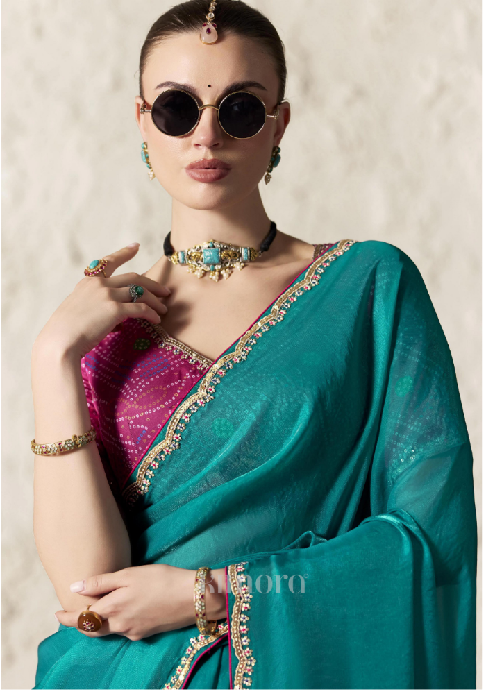 Teal Blue Soft Silk Saree Close-Up with Gold Zari Sequin Lace Border and Embroidered Corner Motif, Luxury Festive Celebration Wear