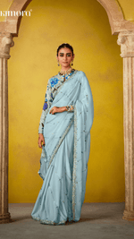 ETHEREAL ELEGANCE: BLUE SILK SAREE WITH EMBROIDERED BLOUSE - Kimora.in