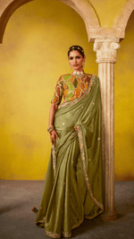 GRACEFUL OLIVE GREEN: A SAREE OF HERITAGE AND ELEGANCE - Kimora.in