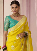 YELLOW DOLA SILK SAREE WITH SEA GREEN GOLDEN EMBROIDERED BLOUSE - Kimora.in