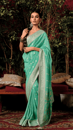EMBRACE TIMELESS GRACE WITH THE SEA GREEN SERENITY SAREE BY KIMORA - Kimora.in
