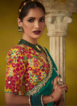 Emerald Green Saree with a Vibrant Floral Embroidered Blouse