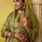 Graceful Olive Green: A Saree of Heritage and Elegance