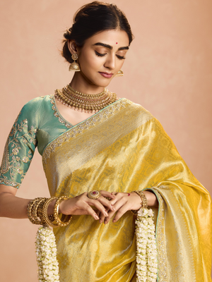 Yellow Kanjivaram Silk Saree with Sea Green Embroidered Blouse