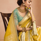 Yellow Kanjivaram Silk Saree with Sea Green Embroidered Blouse