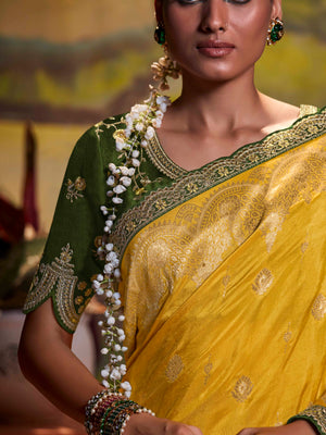 YELLOW PURE DOLA SILK SAREE WITH CONTRASTING GREEN EMBROIDERED BLOUSEE