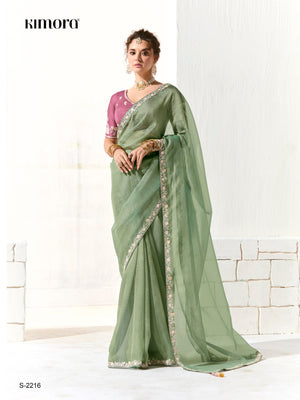 Mint Green Shimmer Saree with Ornate Mauve Purple Embroidered Blouse