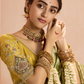 Radiant Green Kanjivaram Silk Saree with Ornate Yellow Blouse – A Regal Ensemble