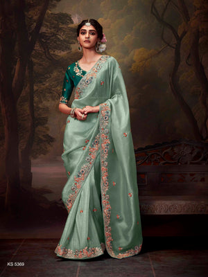 Regal Sea Green Tissue Silk Saree with Intricately Embroidered Bottle Green Blouse