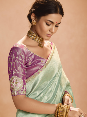 Mint Green Kanjivaram Silk Saree with Elegant Purple Embroidered Blouse – A Dreamy Delight