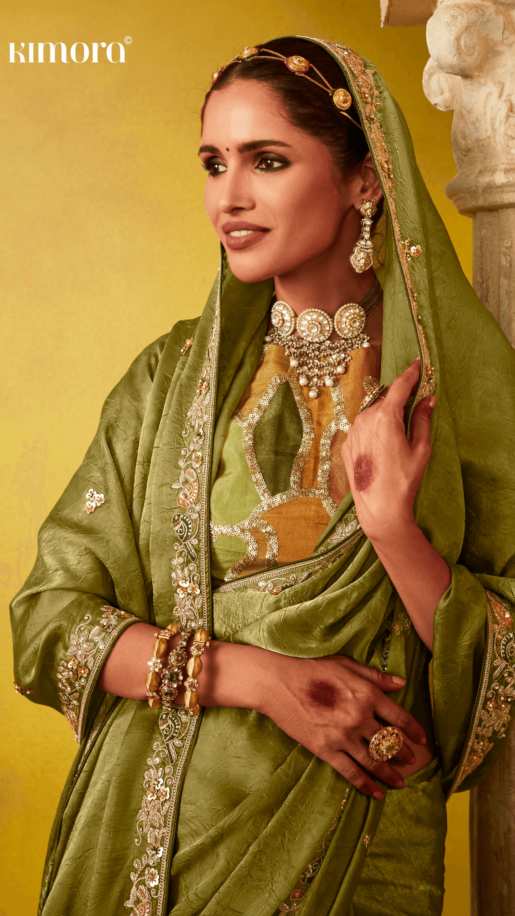GRACEFUL OLIVE GREEN: A SAREE OF HERITAGE AND ELEGANCE - Kimora.in
