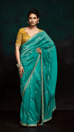 TEAL DESIGNER ORGANZA SAREE WITH HANDCRAFTED EMBROIDERED BORDER – BOLD, ELEGANT, UNFORGETTABLE - Kimora.in