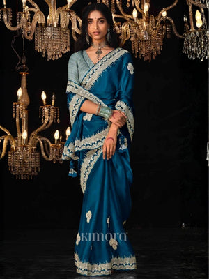 Midnight Glamour premium tissue saree In peacock blue
