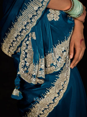 Midnight Glamour premium tissue saree In peacock blue