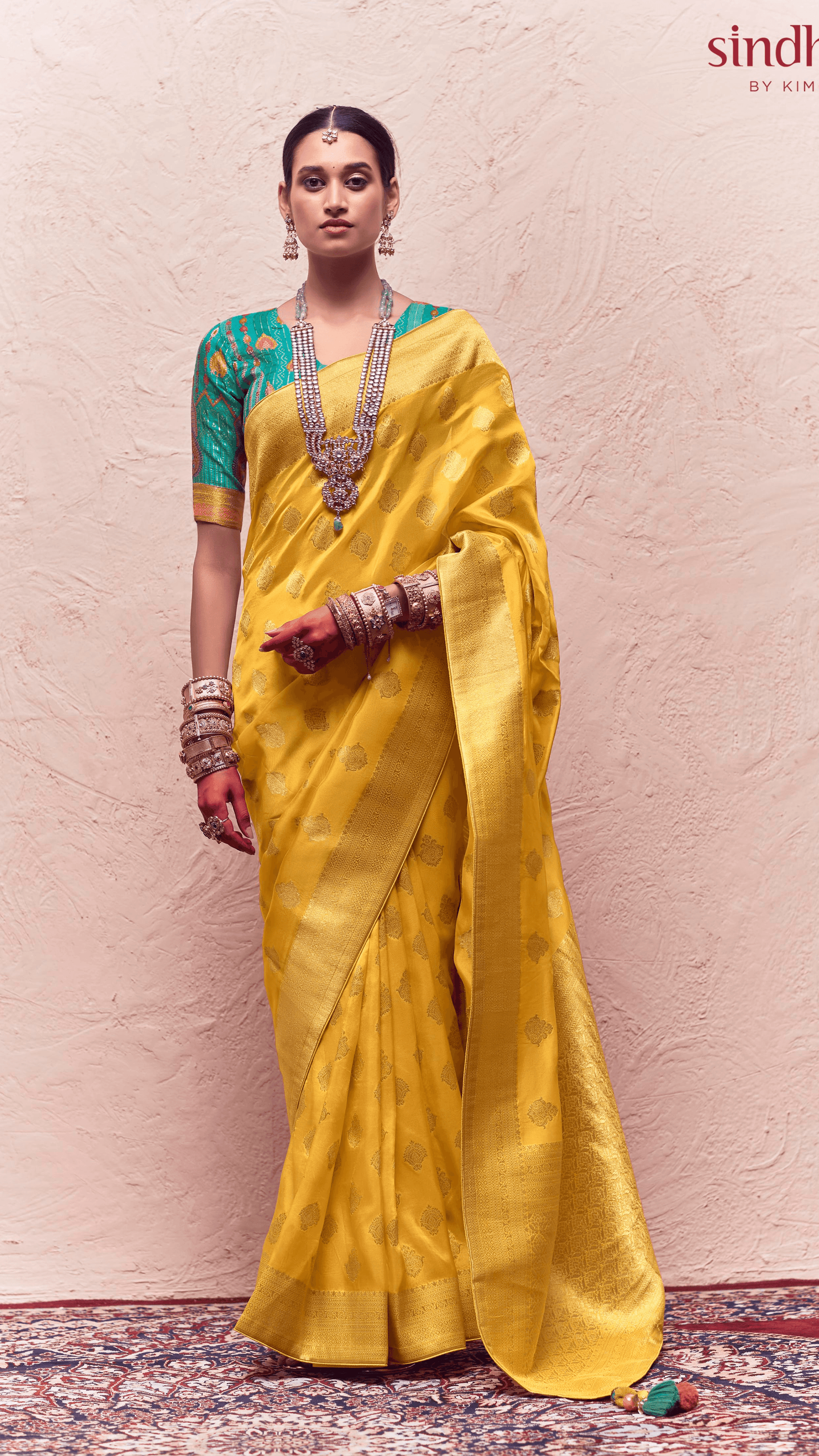 KIMORA’S YELLOW FLORAL BANARASI CREPE DOLA SILK SAREE - Kimora.in