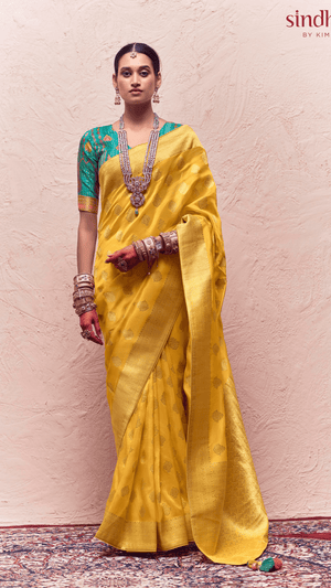 KIMORA’S YELLOW FLORAL BANARASI CREPE DOLA SILK SAREE - Kimora.in