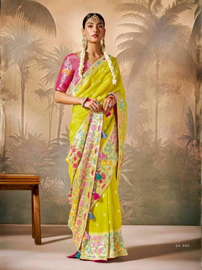 Yellow saree paired with a red blouse