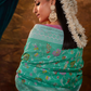 Green Banarasi Silk Saree with Colorful Floral Weaving
