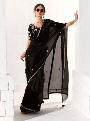 Royal Black Organza Saree with Black Embroidered Blouse – A Symphony of Power and Grace  Meta Description: