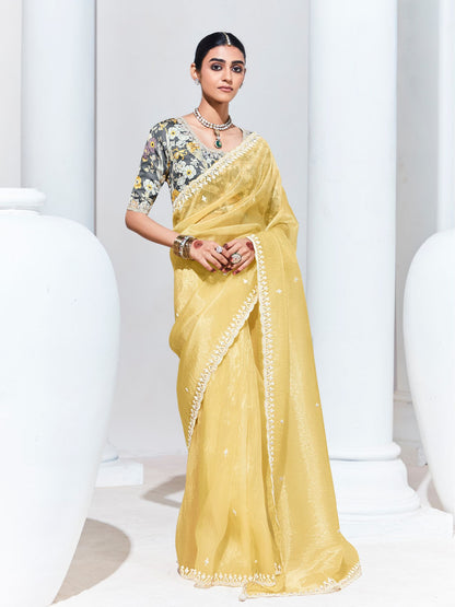 GRACEFUL YELLOW SAREE WITH FLORAL-PRINT BLOUSE – RADIANT ELEGANCE