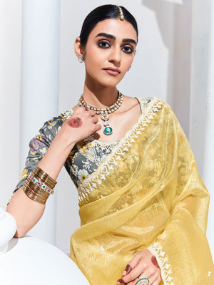 GRACEFUL YELLOW SAREE WITH FLORAL-PRINT BLOUSE – RADIANT ELEGANCE