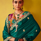 Green Tissue Silk Saree with Embroidered Border and Floral Contrast Blouse