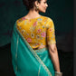 TEAL DESIGNER ORGANZA SAREE WITH HANDCRAFTED EMBROIDERED BORDER – BOLD, ELEGANT, UNFORGETTABLETeal Green Designer Organza Silk Saree