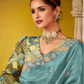 Tissue Silk Saree with Embroidered Border and Floral Blouse