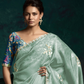 Mint Green Organza Saree with Blue Printed Blouse and Lace Border