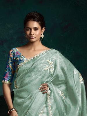 Mint Green Organza Saree with Blue Printed Blouse and Lace Border