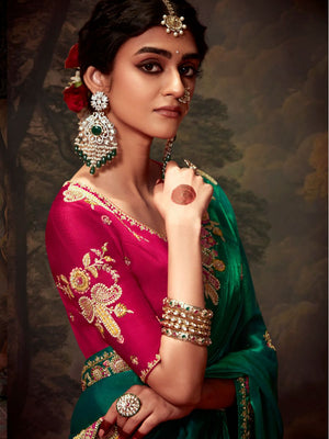 Green Silk Saree with Heavy Embroidery and Contrast Pink Blouse