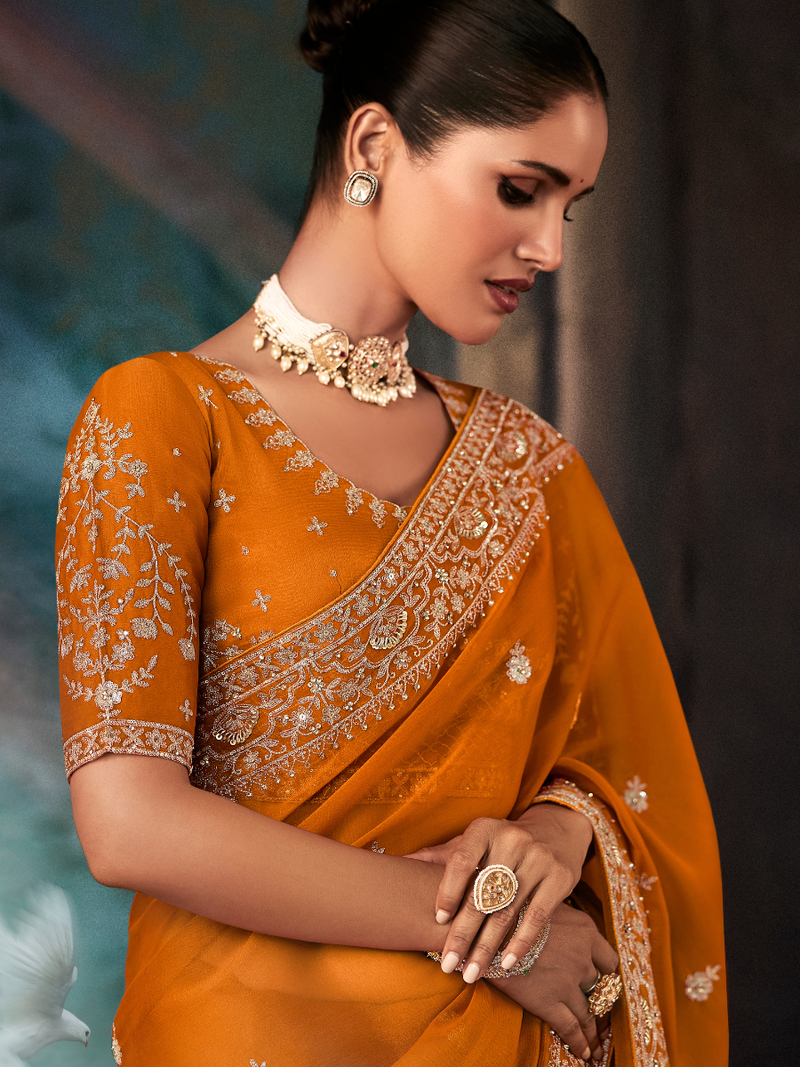 Bright Orange Pure Tissue Silk Blouse with Heavy Embroidery, Stone Work, Resham, Zardoshi and Aari-Zari Detailing for Bridal and Wedding Wear
