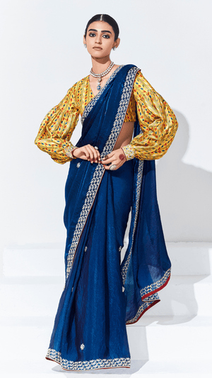 ROYAL BLUE SILK SAREE WITH YELLOW PRINTED PUFF-SLEEVE BLOUSE – A PERFECT BLEND OF TRADITION & TREND - Kimora.in