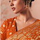 Orange Pure Georgette Bandhani Saree With Peacock Motifs