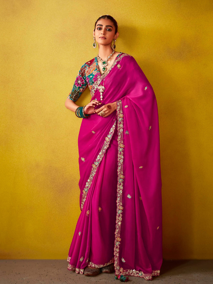 Regal Magenta Elegance: A Timeless Saree Of Opulence