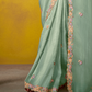 Tissue Silk Saree with Embroidered Border and Floral Blouse