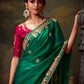 Green Silk Saree with Heavy Embroidery and Contrast Pink Blouse