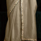 Beige Crush Fabric Saree with Printed Silk Blouse