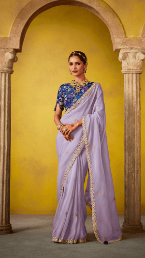 ETHEREAL ELEGANCE: PURPLE SILK SAREE WITH EMBROIDERED BLOUSE - Kimora.in
