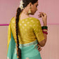 SEA GREEN DOLA SILK SAREE WITH YELLOW GOLDEN EMBROIDERED BLOUSE