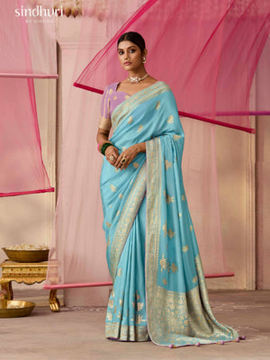 ELEGANT AQUA BLUE DOLA SILK SAREE WITH PURPLE GOLDEN WORK BLOUSE