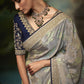 Pastel Grey Silk Saree with Floral Zari Work and Royal Blue Embroidered Blouse – Kimora