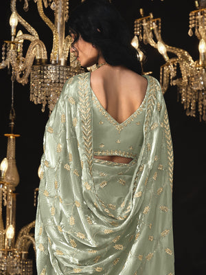 OLIVE GREEN SAREE WITH ELEGANT SILVER EMBROIDERY