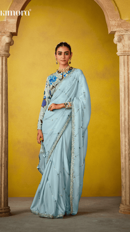 ETHEREAL ELEGANCE: BLUE SILK SAREE WITH EMBROIDERED BLOUSE - Kimora.in