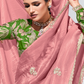 Peach Pure Tissue Silk Saree with Crushed Texture & Contrasting Green Blouse
