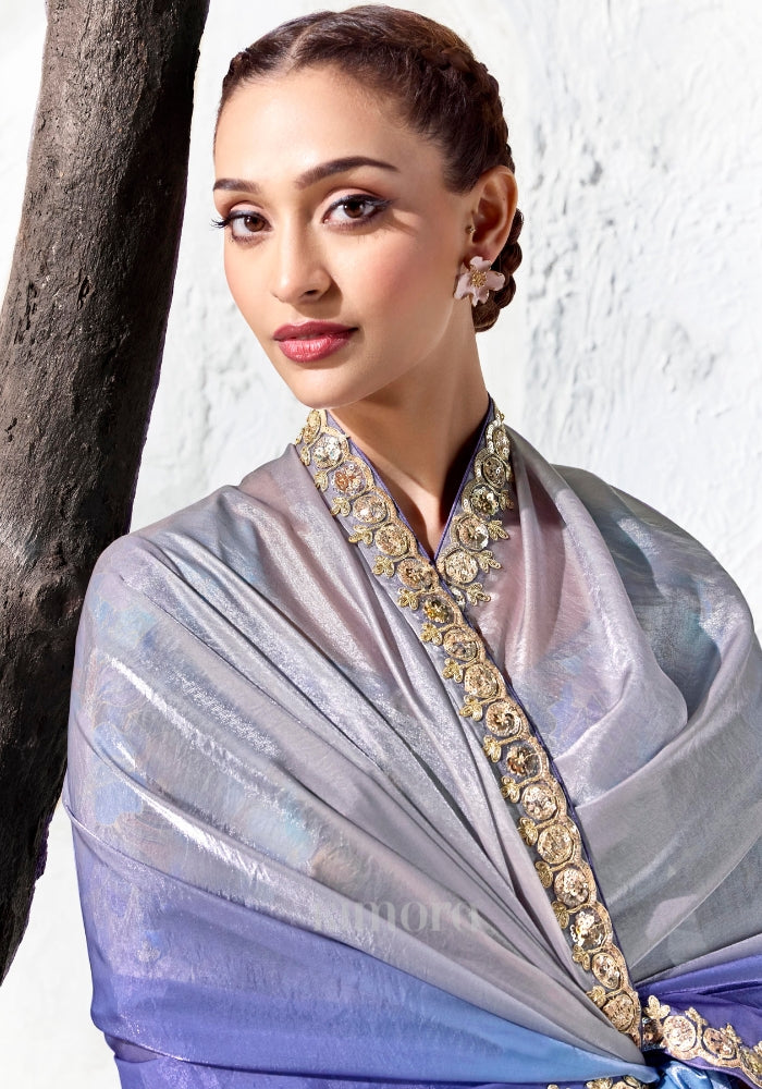 Blue-violet digitally printed satin silk blouse paired with a premium silver to cobalt blue ombre designer saree.