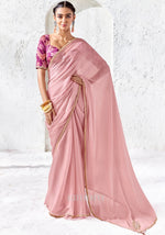Blush pink Tissue Silk saree with zari, sequins and bead embroidery paired with a magenta digitally printed satin silk blouse by Kimora.