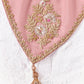 Close-up of the blush pink Tissue Silk saree showcasing intricate zari, sequins and bead embroidered border with elegant craftsmanship.